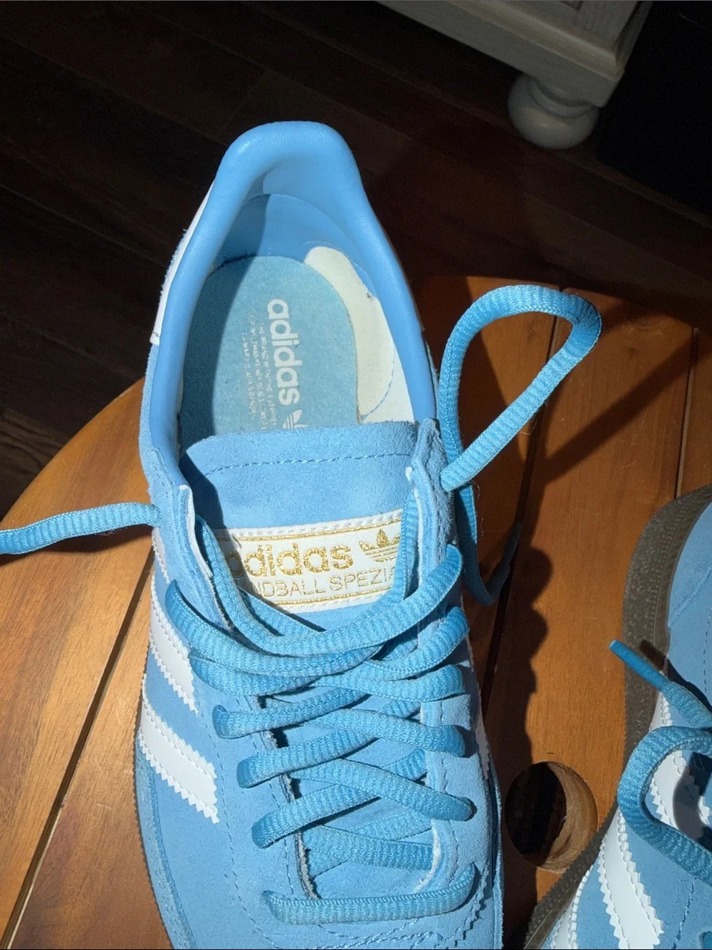 adidas light blue suede sneakers with white stripes